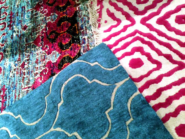 What’s underfoot this month? Layers upon layers of patterned area rugs! - McNabb & Risley